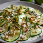Carpaccio de zucchini con crema de almendras y lima